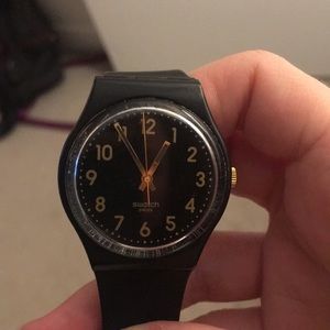 Swatch Watch Matt Black and Gold face